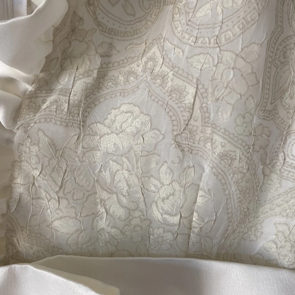 Custom made ivory tone on tone sleeveless dress with satin ruffle and bow. - Picture 4 of 7